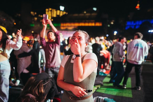 A Matilda fan cries  after the Matildas win the penalty shootout.