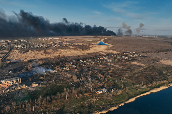 A general view of smoke rising from the Avdiivka Coke and Chemical Plant behind the village of Lastochkino, in Avdiivka district, Ukraine. 