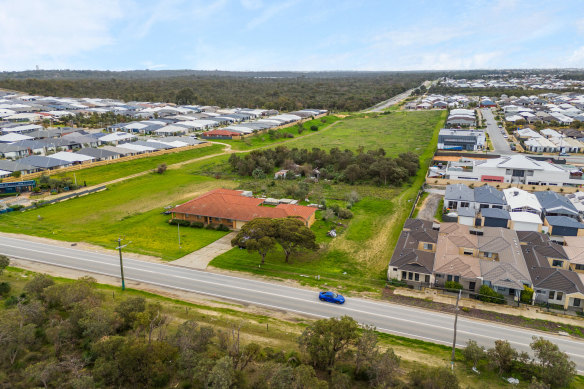 This large property stands out among a sea of new builds in Hammond Park. 