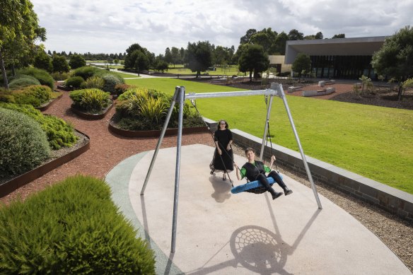 Tania Davidge and Kirsten Bauer at the children’s playground at Bunurong Memorial Park and Cemetery. 