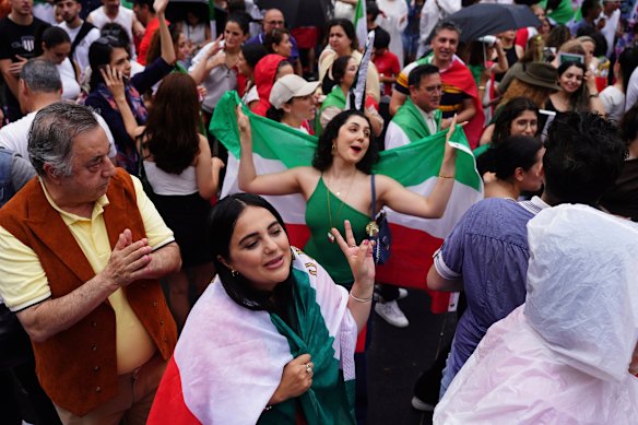 Iranian diaspora gather at the Victorian Parliament, Melbourne, after the death of Ayatollah Ali Khamenei on March 1.