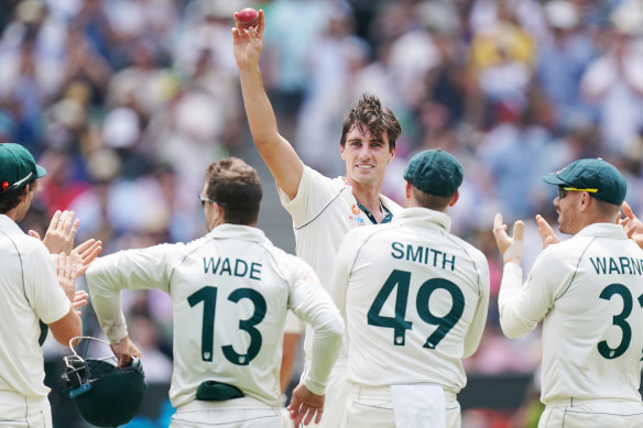 Pat Cummins celebrates five wickets on day three of the Boxing Day Test. 