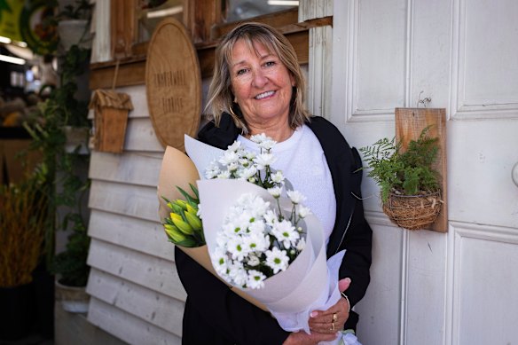 Camberwell Florist customer Maree Mursell picks up Mother’s Day flowers for her daughters-in-law and own mother.