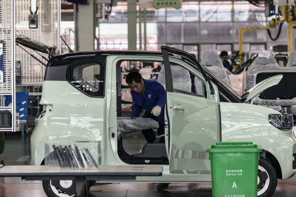 An assembly line for mini electric cars in Liuzhou. China’s electric vehicle production and sales both more than doubled in July.