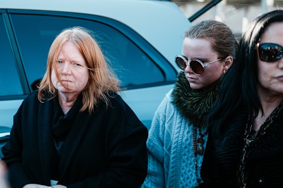 Rex Heuermann's wife, Asa Ellerup, left, and daughter Victoria Heuermann arrive outside the Suffolk County Courthouse.
