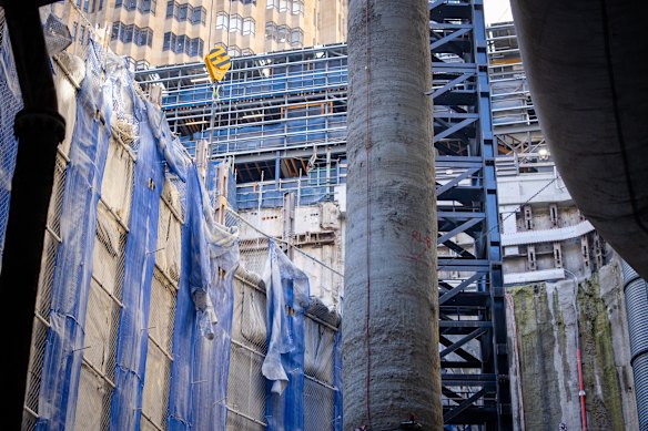 The final tunnel boring machine is being disassembled and lifted out of this shaft.