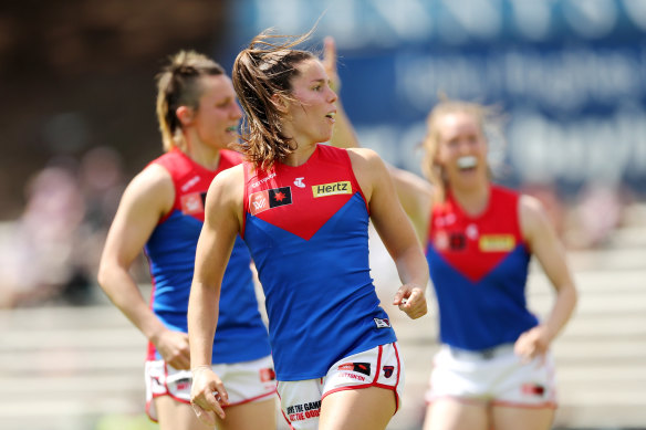 Kate Hore of the Demons celebrates after scoring a goal during the 2022 S7 AFLW Round 06 match between the Fremantle Dockers and the Melbourne Demons at Fremantle Community Bank Oval.