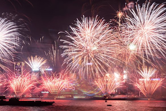 Fireworks explode over Victoria Harbour to celebrate the start of 2025 at Tsim Sha Tsui in Hong Kong.