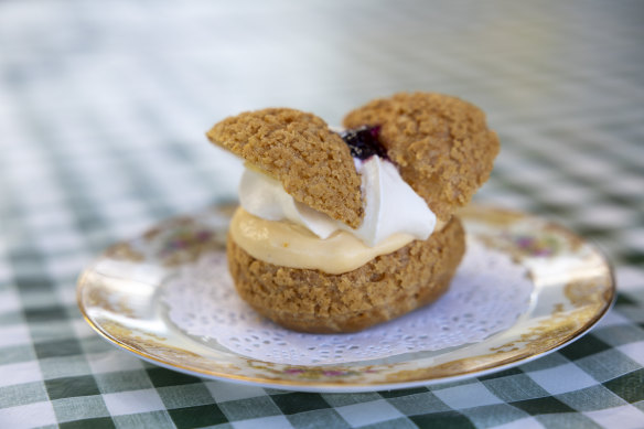 Butterfly profiterole with pillowy cream, creme brulee custard and Davidson plum jam.