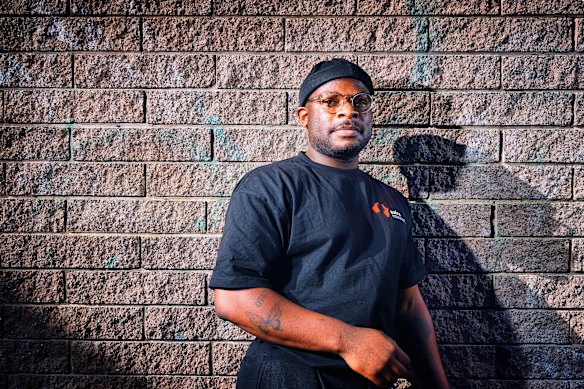 Jiress Musafiri works with families in his role with the Australian African Foundation for Retention and Opportunity.