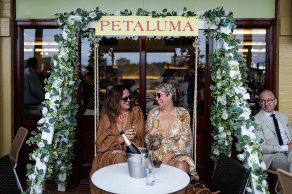 Liz and Sally enjoy champagne during Championships Day 1.