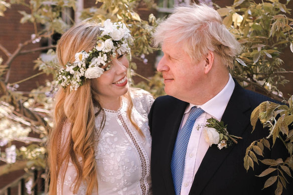 Boris  Johnson with his wife, Carrie Johnson (nee Symonds), at their wedding earlier this year. 