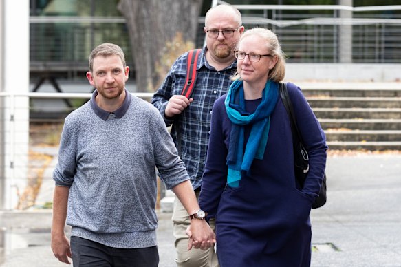 Josh and Anna-Marie Terrington and Matthew Patterson (centre) leave the court.
