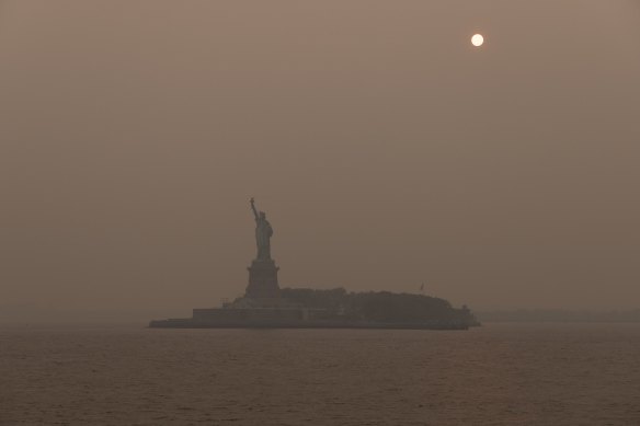 The Statue of Liberty shrouded in smoke from Canada wildfires in New York last week.