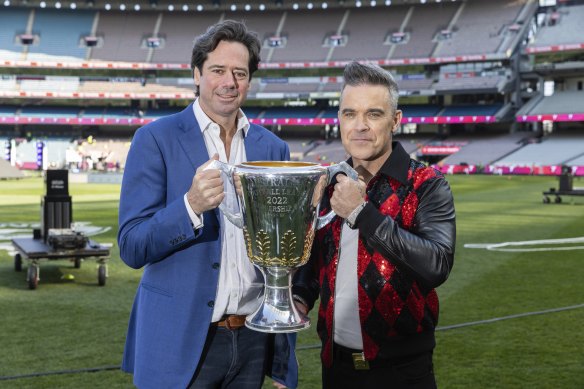 AFL chief executive Gillon McLachlan at the MCG on Thursday with singer Robbie Williams, who will entertain  at the grand final,