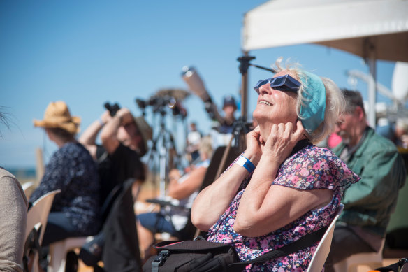 People gather ahead of a total solar eclipse at a viewing site 35km from Exmouth, Western Australia, Thursday, April 20, 2023.