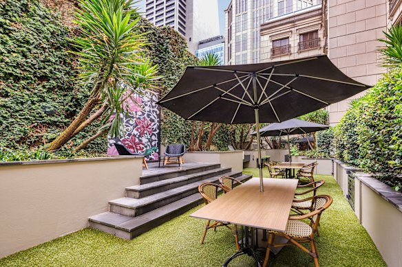 The communal outdoor barbecue space. 