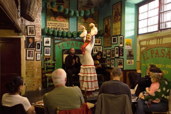 A flamenco dancer commands Tabanco El Pasaje’s timber stage.