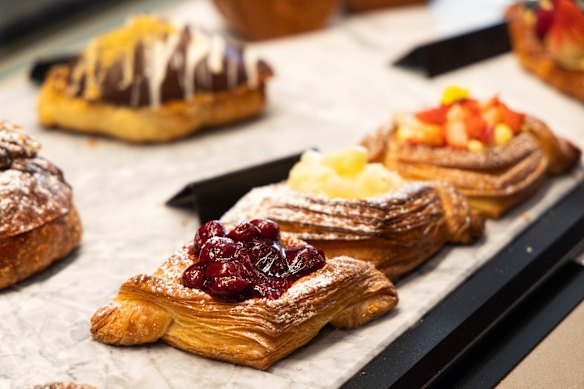 Danishes filled with fruit are joined by globally trending pastries that attract queues.
