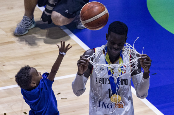 Tournament MVP Dennis Schroeder celebrates after Germany’s World Cup final win over Serbia.