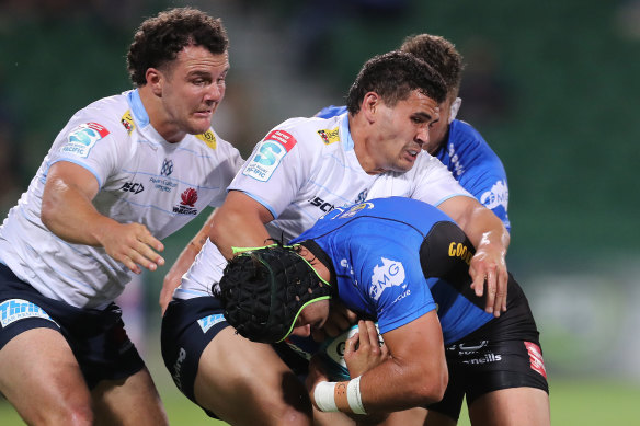 Byron Ralston of the Force tries to break through the Waratahs defence.
