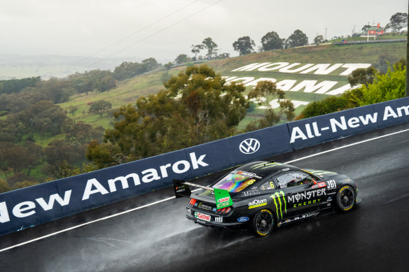 Cam Waters takes his Tickford Racing Ford Mustang around the Mount Panorama circuit in the rain on Saturday.