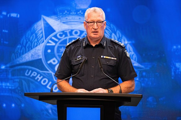 Police Commander Tim Pully speaks to the media on Friday morning.