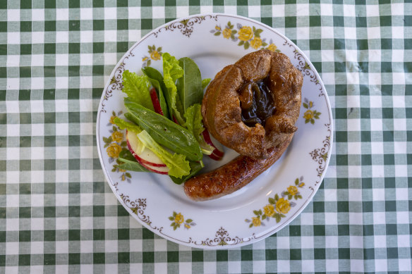 Pigs head sausage Yorkshire pudding and onion gravy. 