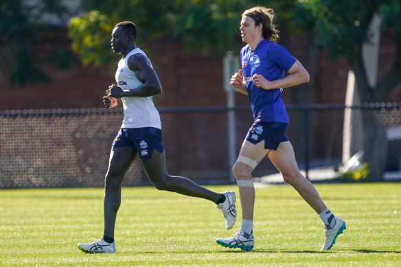 Majak Daw (left) and Ben Brown at a Kangaroos training session last month.