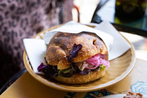 My charcoal chicken roll made using dense springy bread with pickled red onion and dripping with green chilli mayonnaise. 