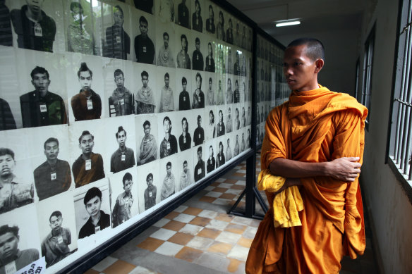 Portraits of Khmer Rouge victims paper the walls of the Tuol Sleng genocide museum in Phnom Penh, Cambodia.