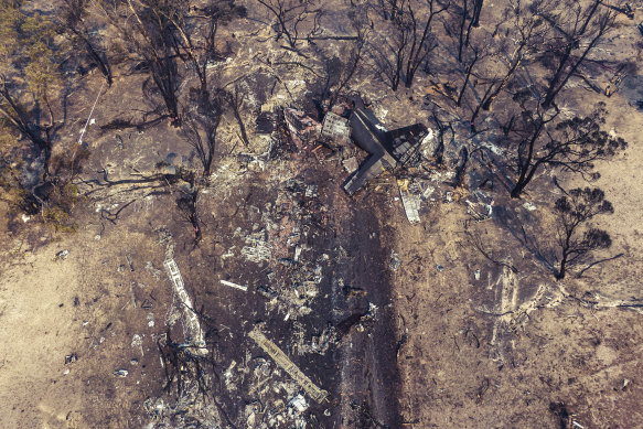 An aerial photo provided by the New South Wales Police shows wreckage at the crash site of a firefighting C-130 Hercules air tanker near Numeralla, south-west of Sydney, in January 2020.