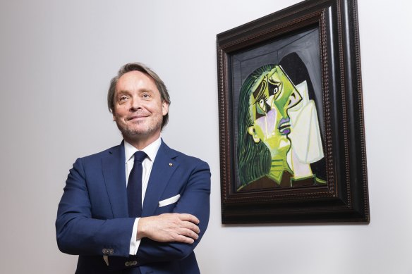 Tony Ellwood, director of the NGV, with The Weeping Woman by Picasso.