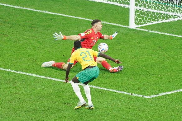 Garang Kuol is denied by Argentina goalkeeper Emiliano Martinez at the World Cup.