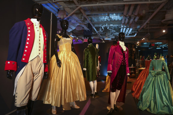 Costumes from the Broadway musical <i>Hamilton</i> are displayed at the <i>Showstoppers! Spectacular Costumes from Stage & Screen</i> exhibit in Times Square in 2021.