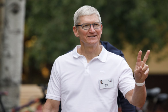 Apple CEO Tim Cook: Ninety-nine million reasons to be happy.