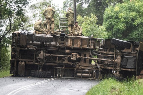 One of the ADF trucks which rolled on its side on Saturday afternoon.