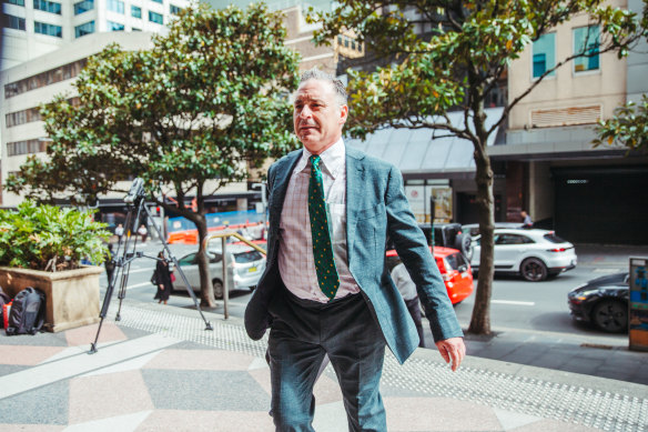 Former TV presenter Andrew O’Keefe arrives at Downing Centre Local Court on Wednesday morning for his hearing on charges of assault and resisting arrest.