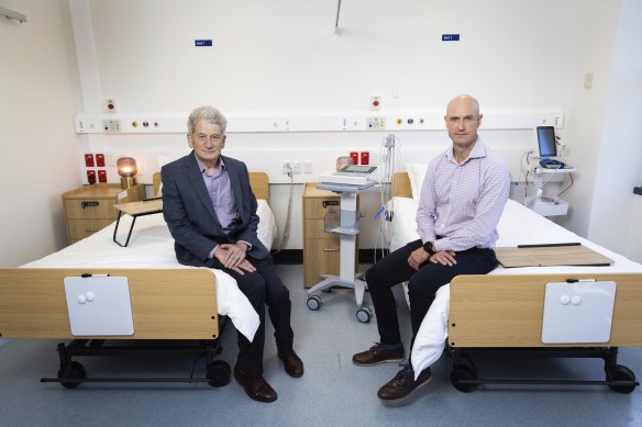 Professor James McCarthy (left) and Dr Andrew Brockway of Doherty Clinical Trials at the unit’s temporary East Melbourne facility.