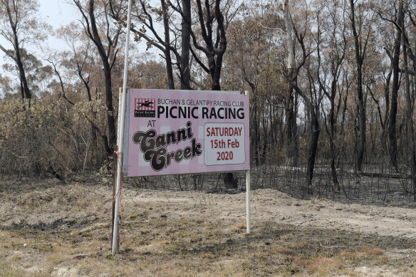 A sign lets locals know the race meeting will go ahead next month.