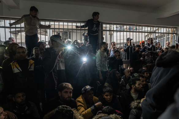 Syrians crowd Sednaya in a desperate search for friends and family.