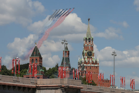 Jets fly over the Kremlin during the parade.