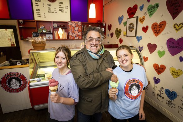 Jock Main from Jock’s Ice Cream & Sorbet in Albert Park with employees Greta Nusimovich Mateo, left, and Queenie Main, right, his daughter.
