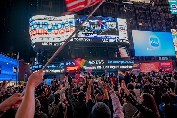 People celebrate as President-elect Joe Biden is declared the winner of the US presidential election.