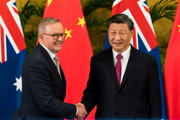 Anthony Albanese and Xi Jinping greet each other at the G20 summit in Bali.