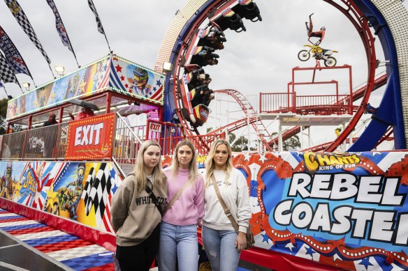 Ellie Thorburn (left), Leah Thorburn (centre) and Kelly Bell (right) after riding the Rebel Coaster.