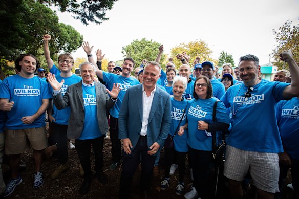 Tim Wilson with supporters as he claimed victory in Goldstein.