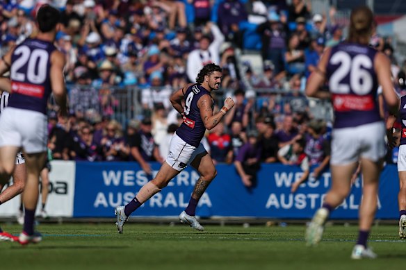 Luke Jackson celebrates one of the Dockers’ many goals in their thrashing of North Melbourne at Hands Oval in Bunbury. 