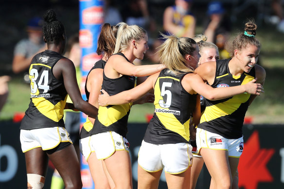 Ellie McKenzie celebrates after scoring in the Tigers’ win over West Coast. 