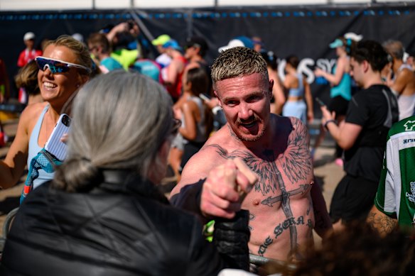 Rosslyne and Michael Wilson have a moment at the finish line.